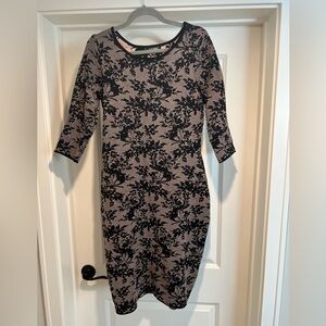 Medium long sleeve black and pink printed sweater dress.